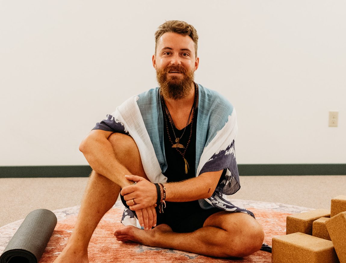 James, trauma-sensitive yoga teacher at More Joy Wellness