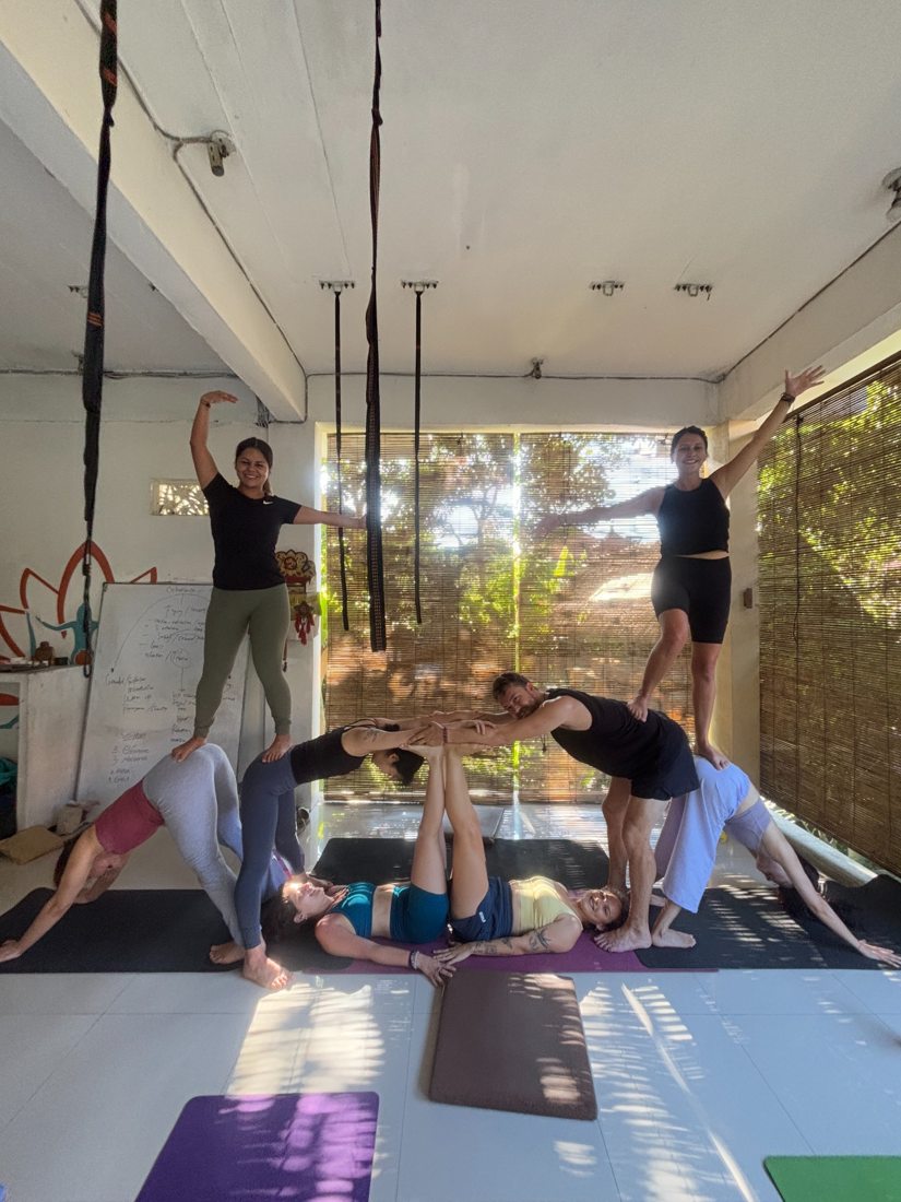 Playful group partner yoga