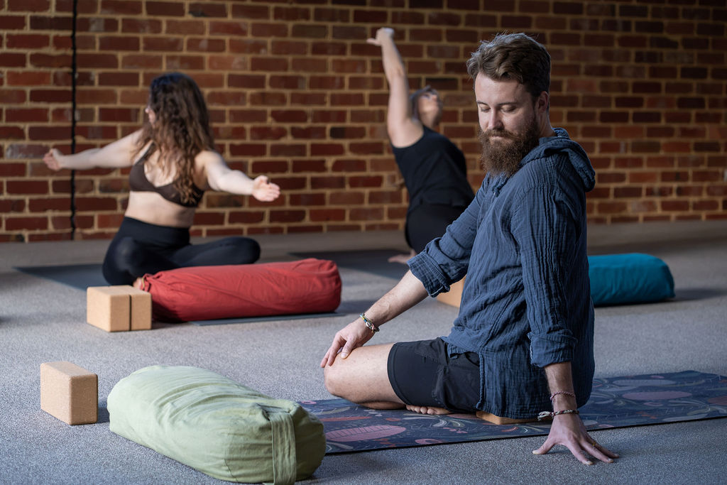 James leading a gentle yoga class